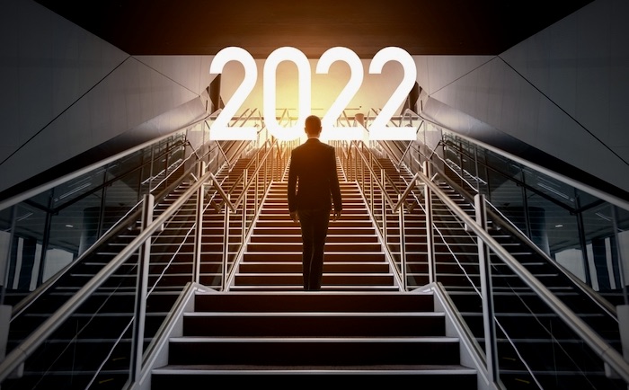 New,year,concept,of,2022.,new,year's,card.,businessman,on